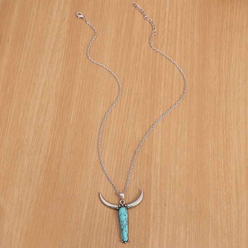 Turquoise Vintage Cow Skull Cross Necklace - product image 4