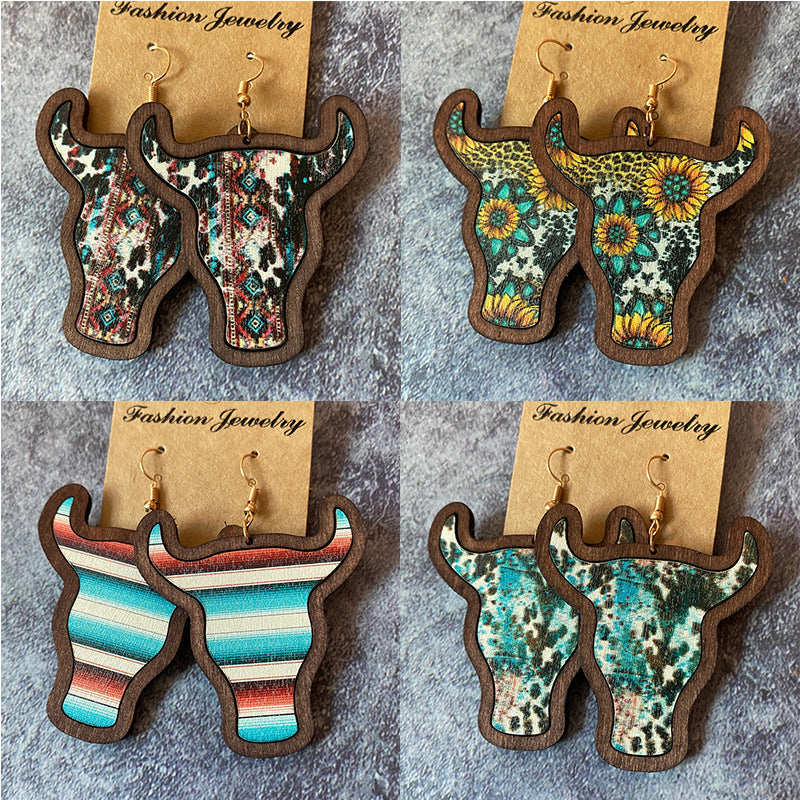 Western Boho Vintage Cow Skull Cross Earrings - product image 1