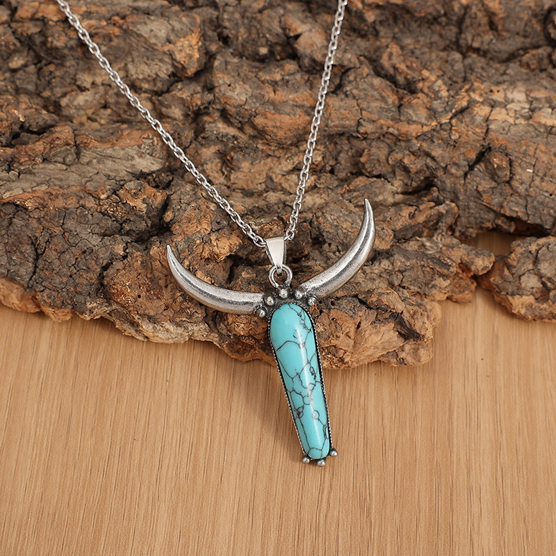 Turquoise Vintage Cow Skull Cross Necklace - product image 2