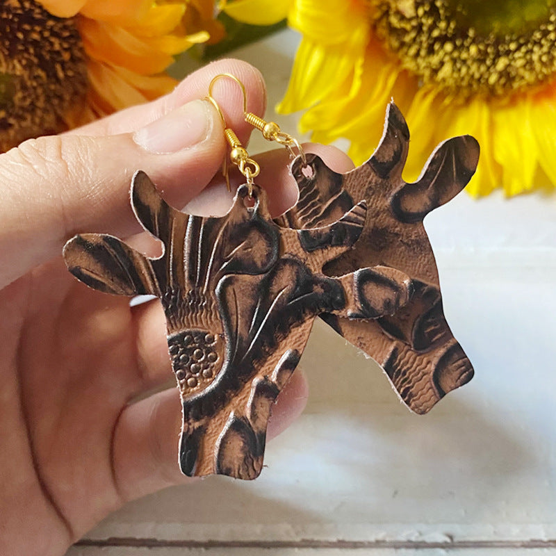 Western Vintage Cow Skull Cross Leather Earrings - product image 2
