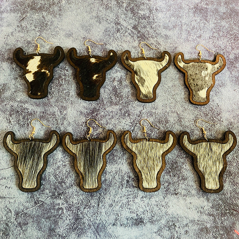 Western Vintage Cow Skull Horse Cross Earrings - product image 1