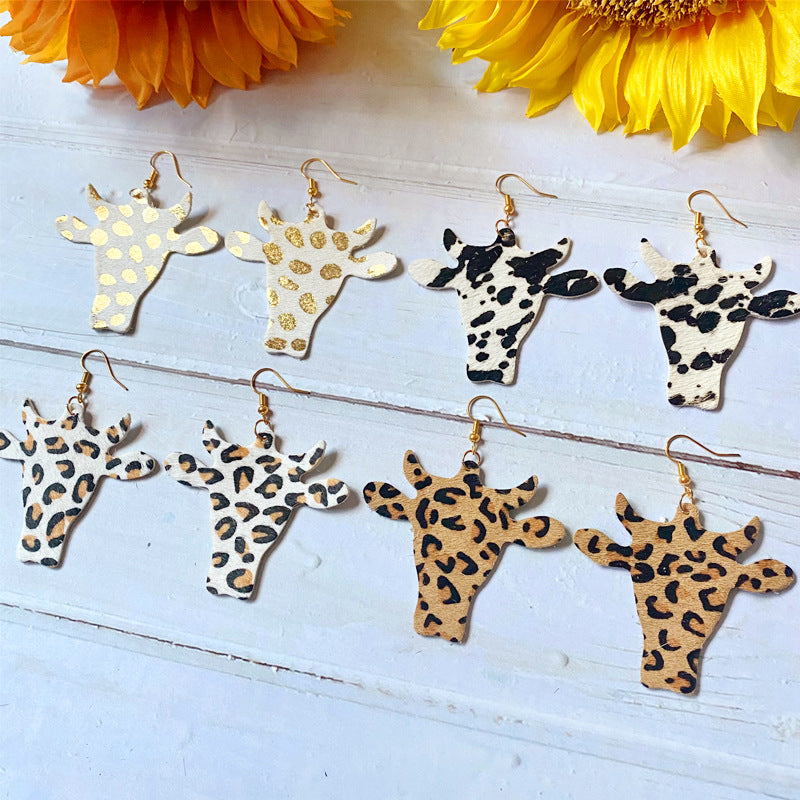 Western Vintage Cow Skull Horse Cross Earrings - product image 1