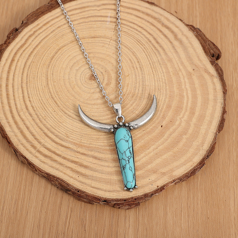 Turquoise Vintage Cow Skull Cross Necklace - product image 3