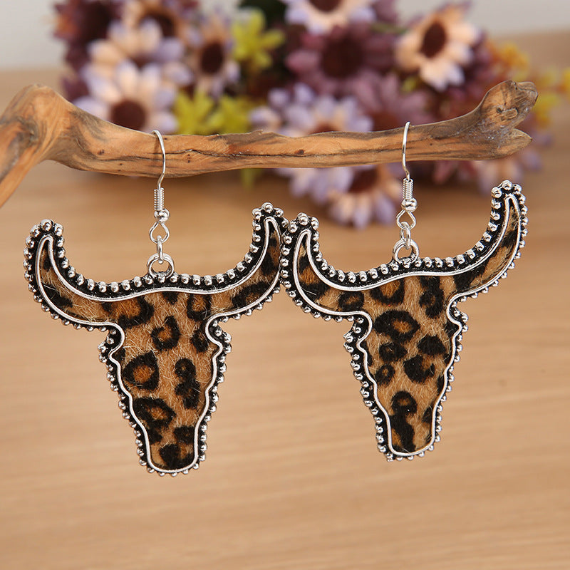 Western Vintage Cow Skull Cross Leather Earrings - product image 1