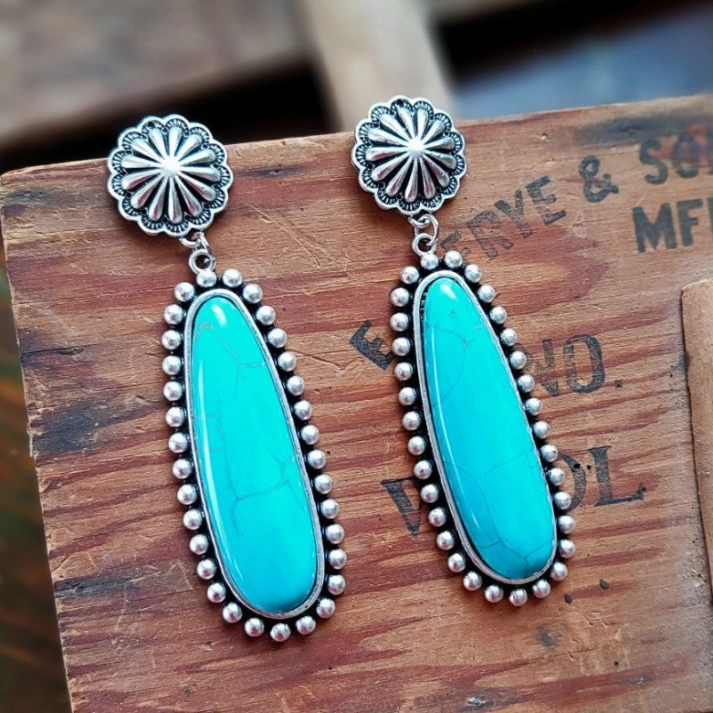 Turquoise Statement Floral Cross Earrings - product image 1