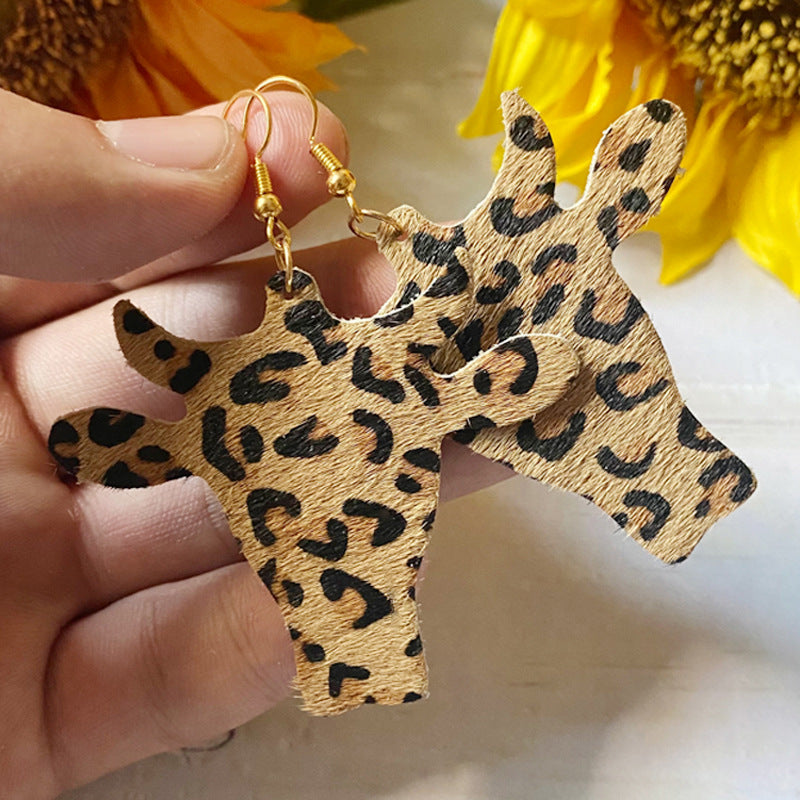 Western Vintage Cow Skull Horse Cross Earrings - product image 3