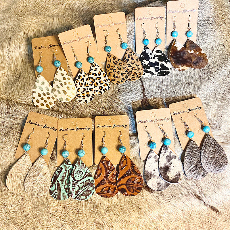 Western Turquoise Vintage Horse Cross Earrings - product image 1