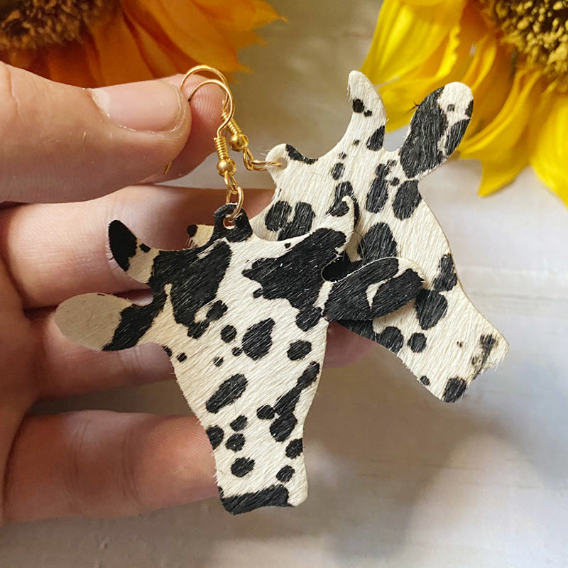 Western Vintage Cow Skull Horse Cross Earrings - product image 2