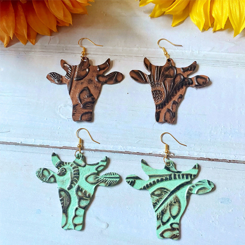 Western Vintage Cow Skull Cross Leather Earrings - product image 1