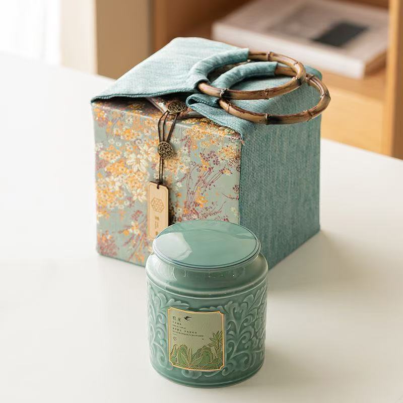 AuienTea Jasmine Tea Gift Set, Embossed Celadon Ceramic Tea Caddy, Vintage Floral Fabric Gift Basket with Bamboo Handle, Scented Tea for Holiday & Business Gifting