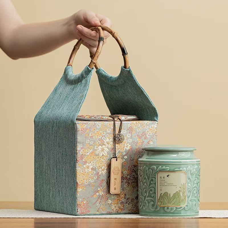AuienTea Jasmine Tea Gift Set, Embossed Celadon Ceramic Tea Caddy, Vintage Floral Fabric Gift Basket with Bamboo Handle, Scented Tea for Holiday & Business Gifting