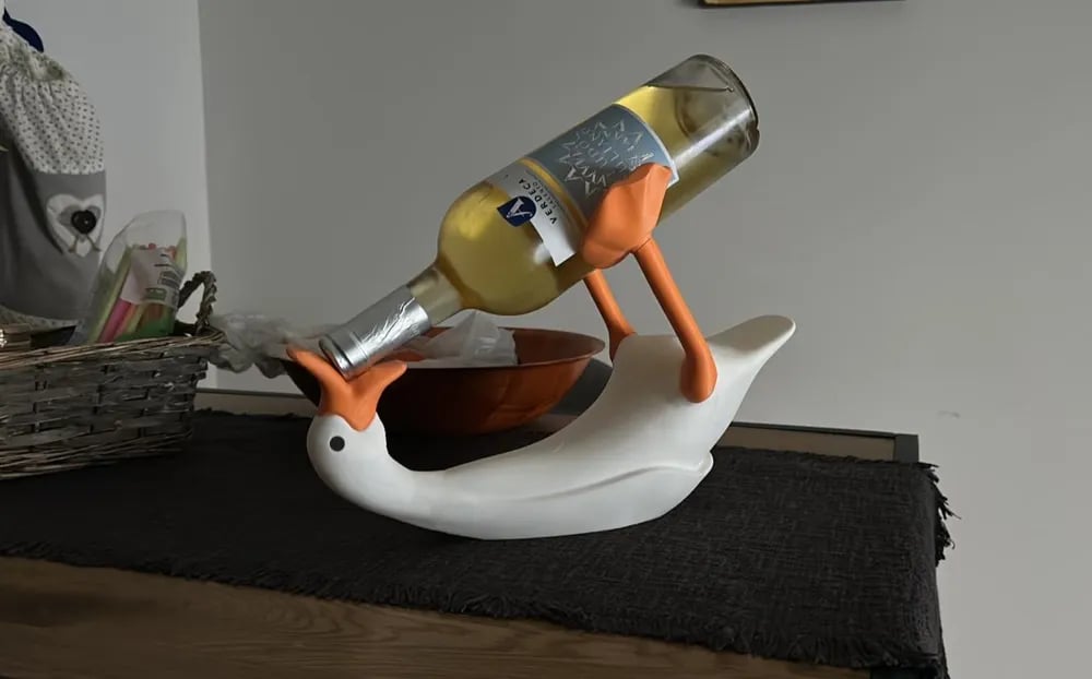 Goose holder with standard wine bottle