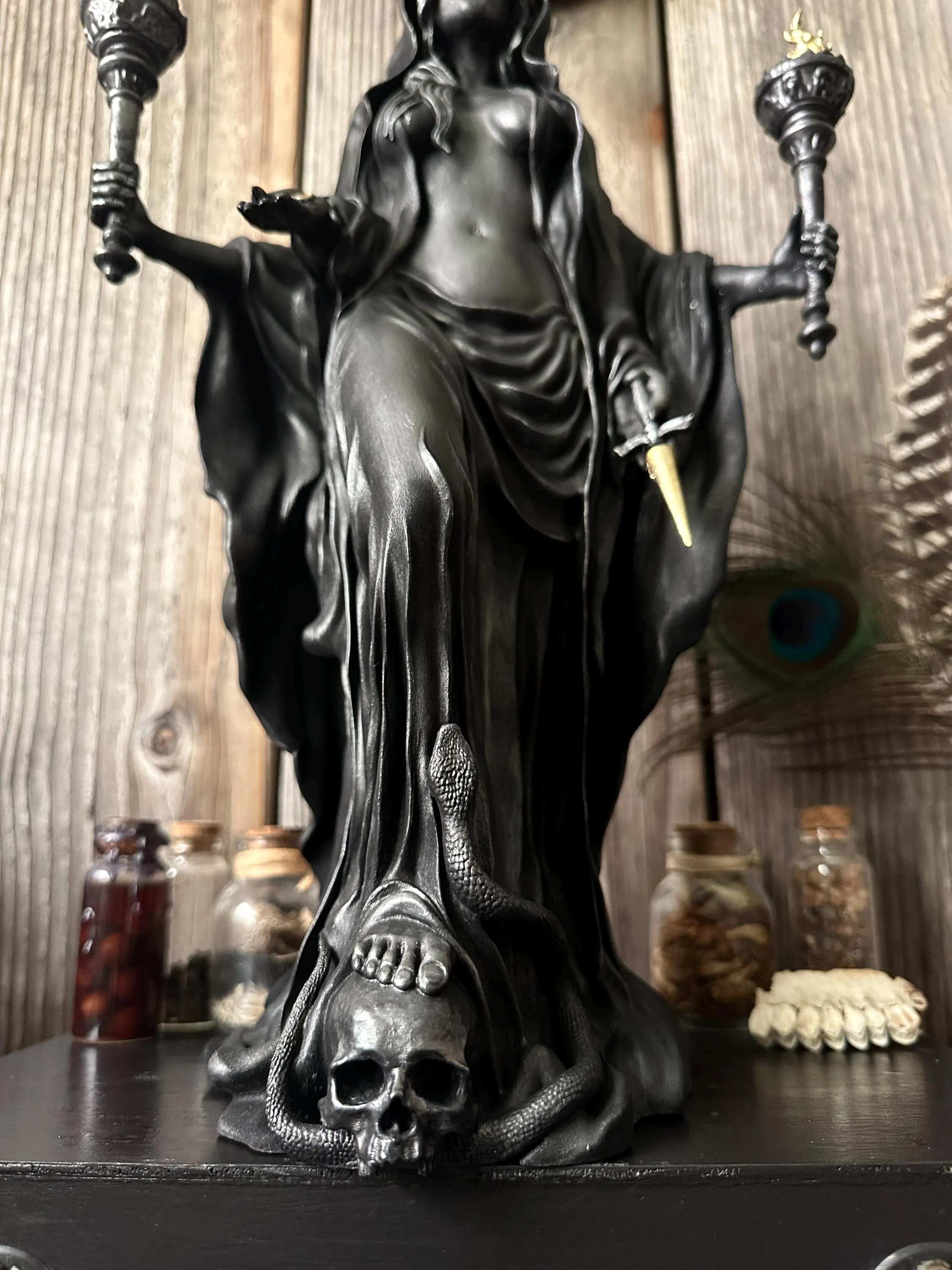 Resin Hecate statue sculptural carving texture close-up