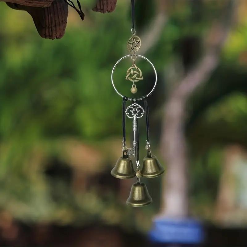 Witch Bells on textured wall display