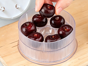 Step 1: Fill 7 cherries into tray