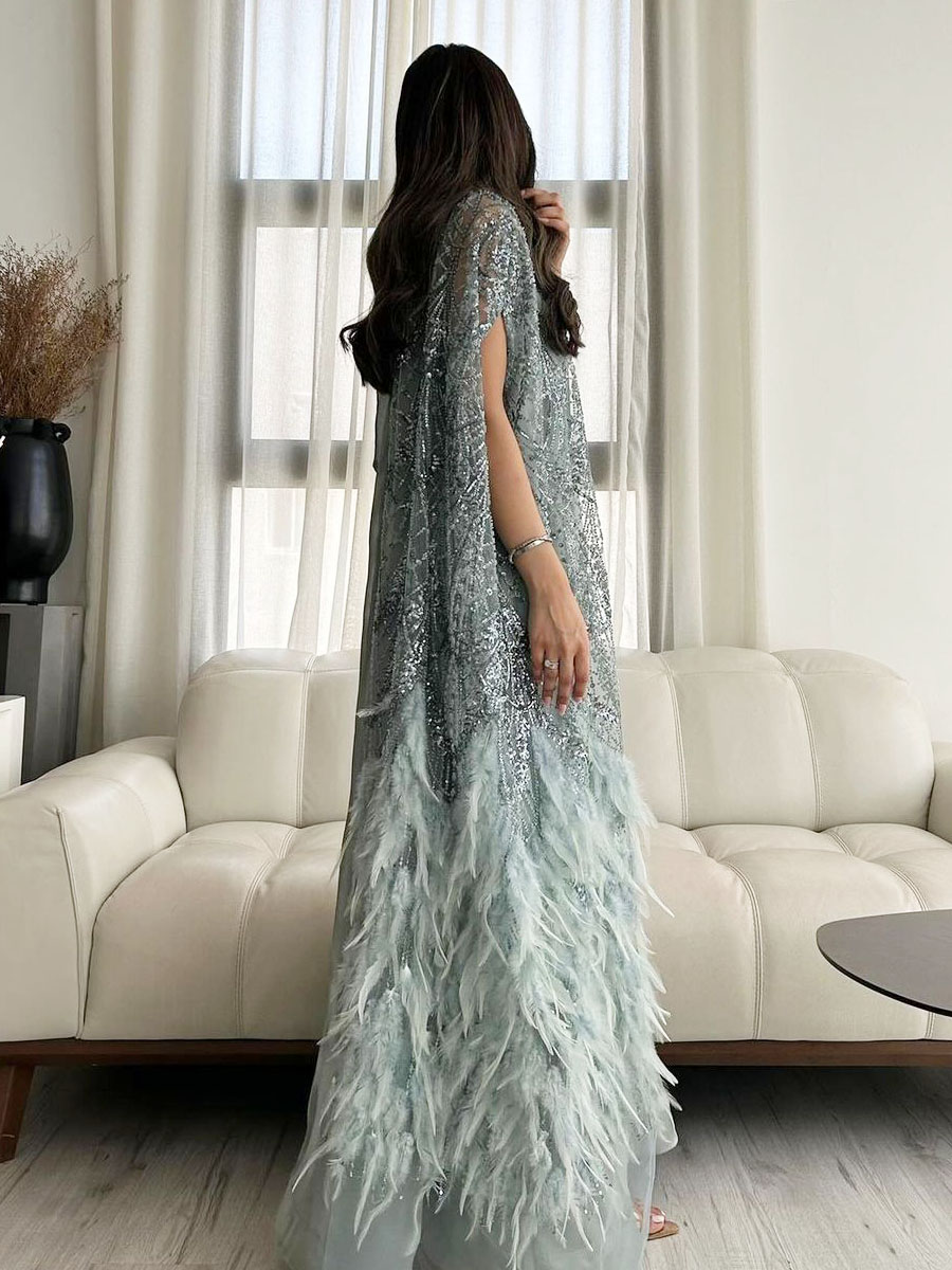 Light blue dress decorated with butterfly feathers and sequins (promotional price)
