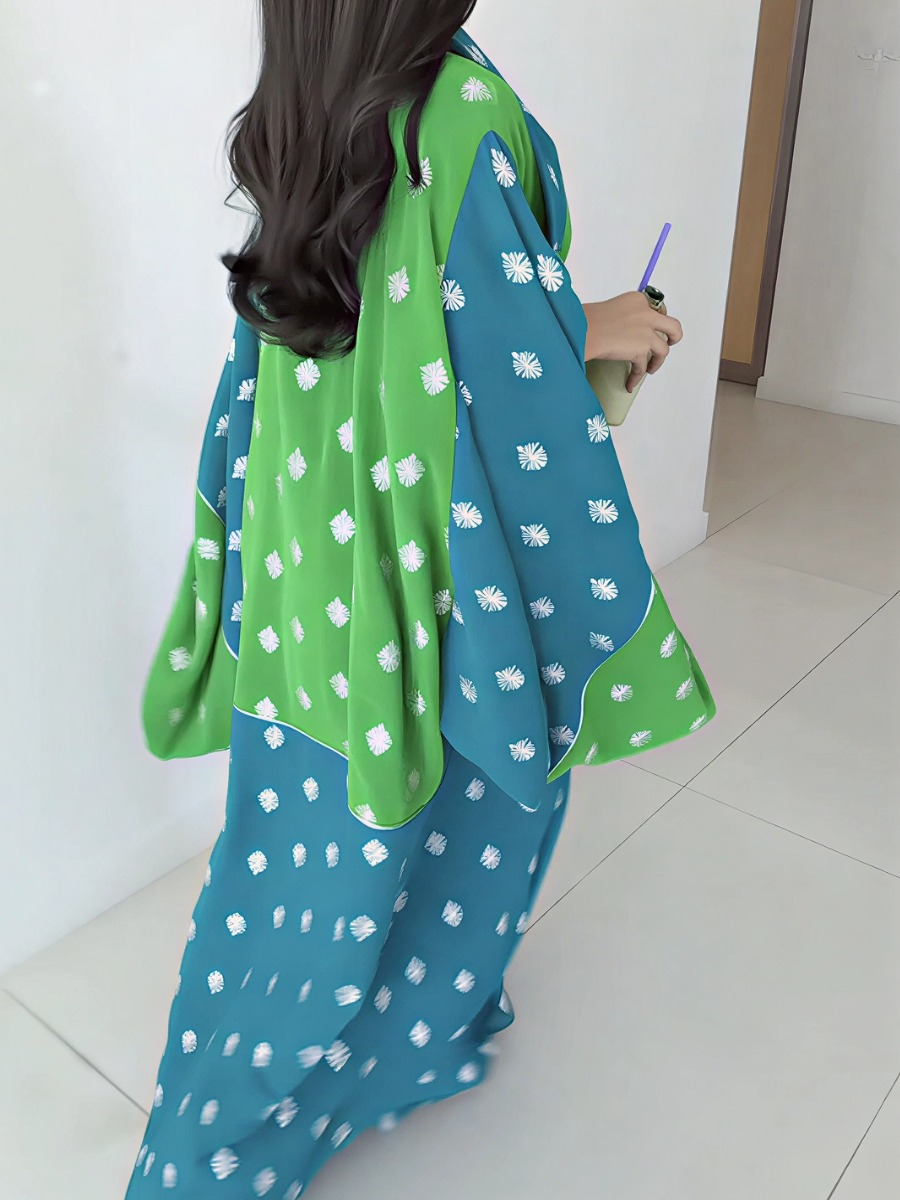 Elegant abaya with gradient colors and floral prints