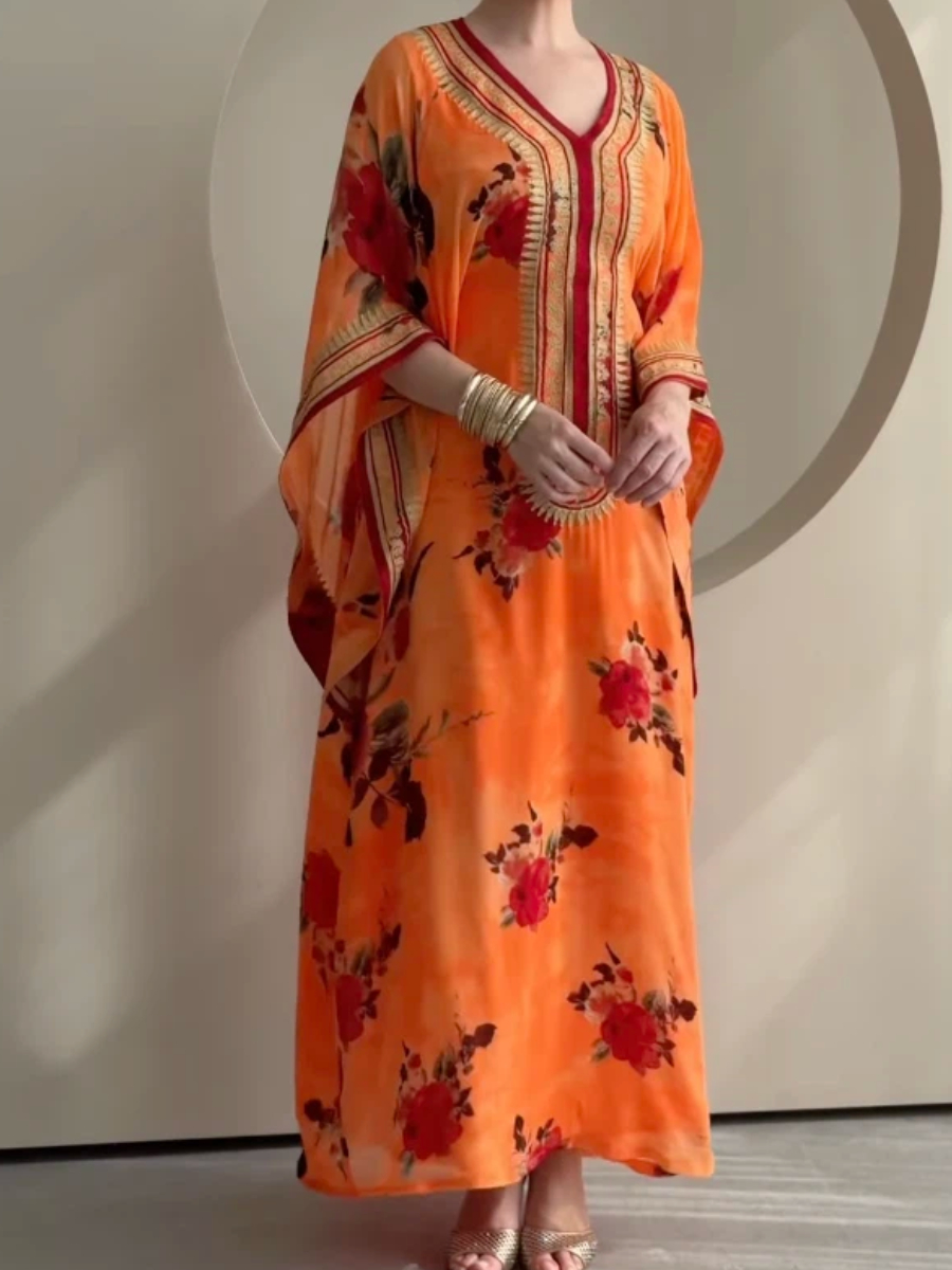 Luxurious kaftan with floral print and elegant embroidery