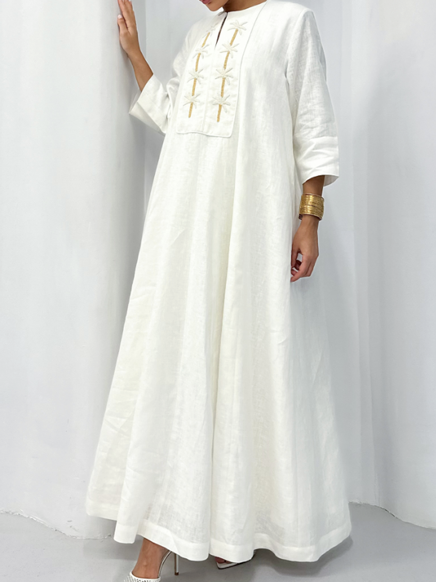 Elegant white linen embroidered dress