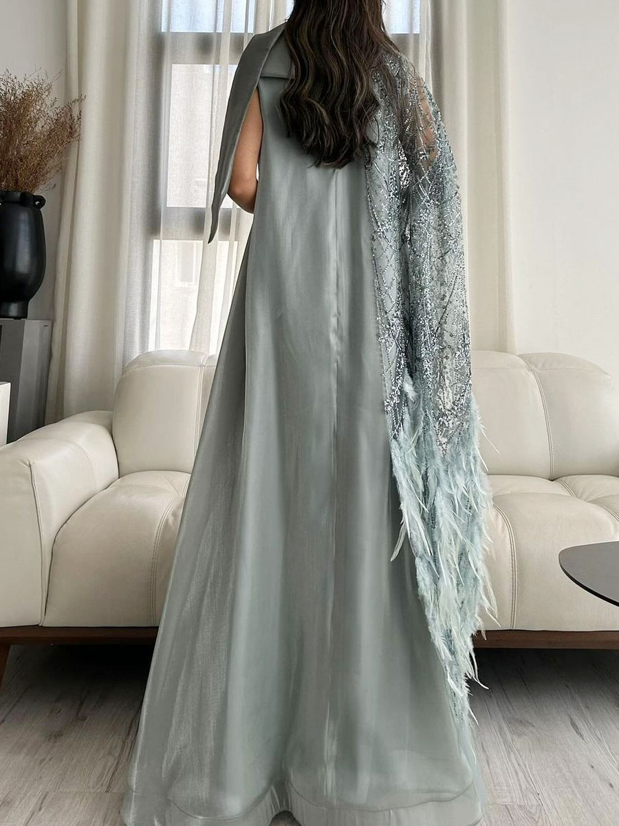 Light blue dress decorated with butterfly feathers and sequins (promotional price)