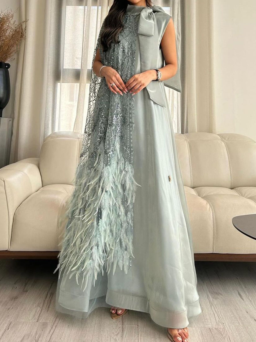 Light blue dress decorated with butterfly feathers and sequins (promotional price)
