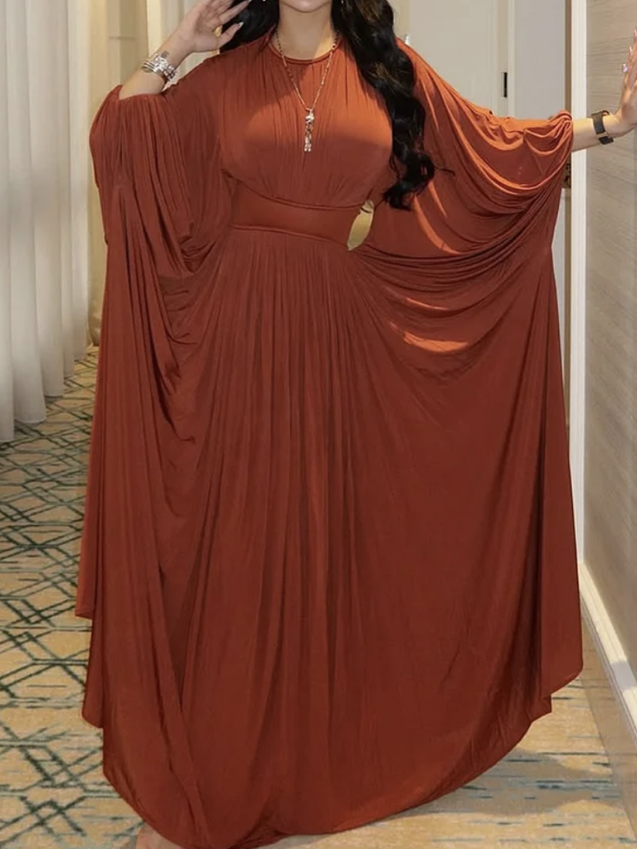 Orange dress with a round neck and pleats