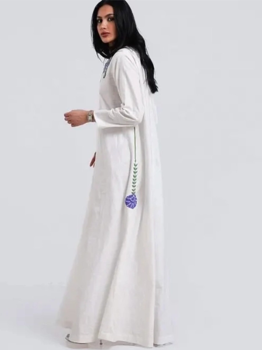 Elegant long white dress with beaded floral embroidery