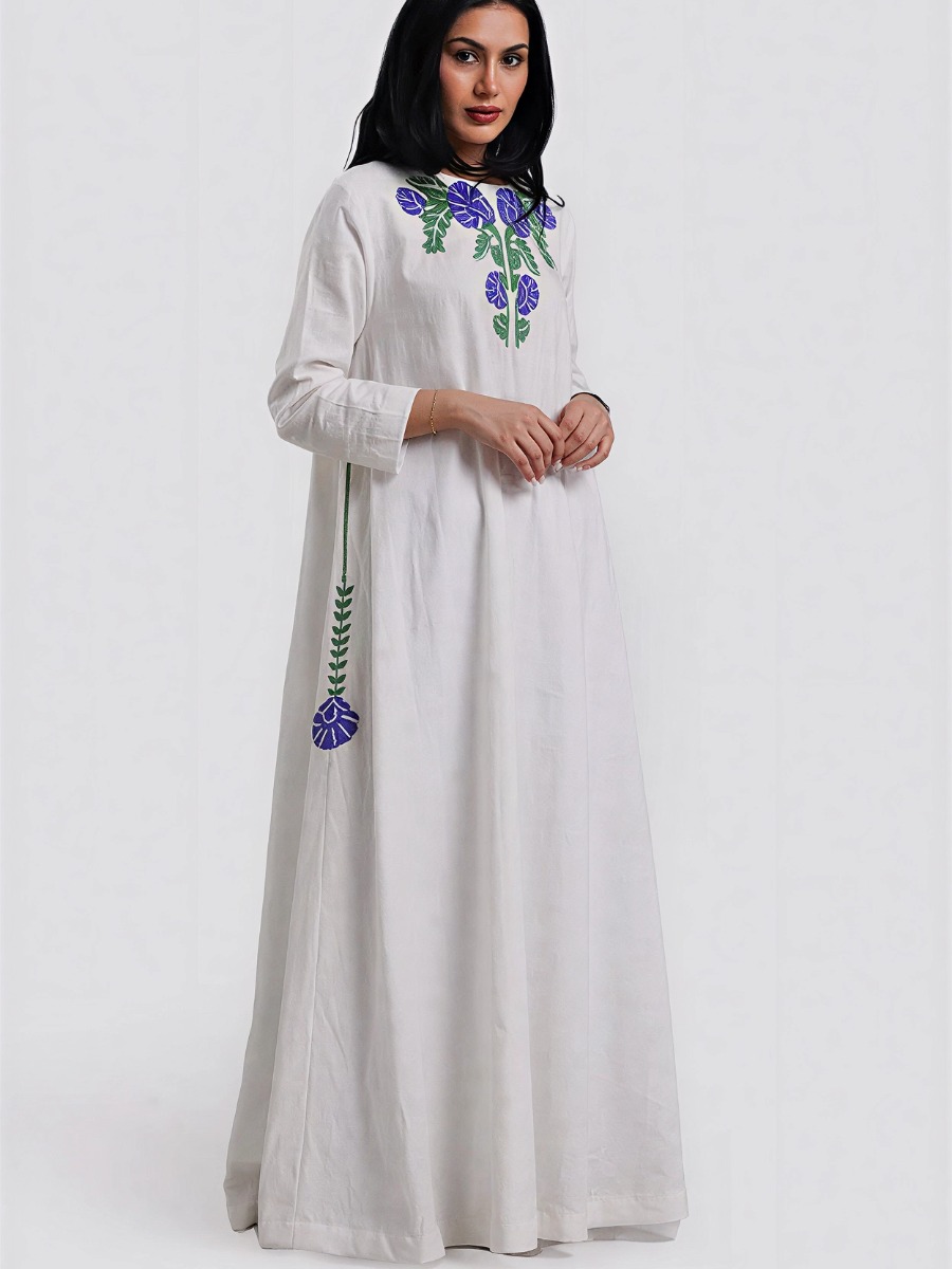 Elegant long white dress with beaded floral embroidery