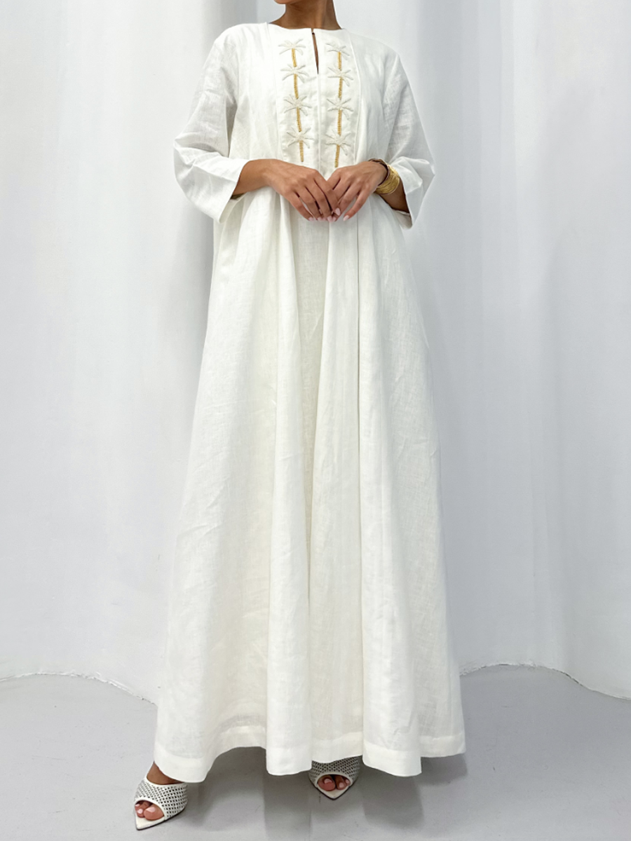 Elegant white linen embroidered dress