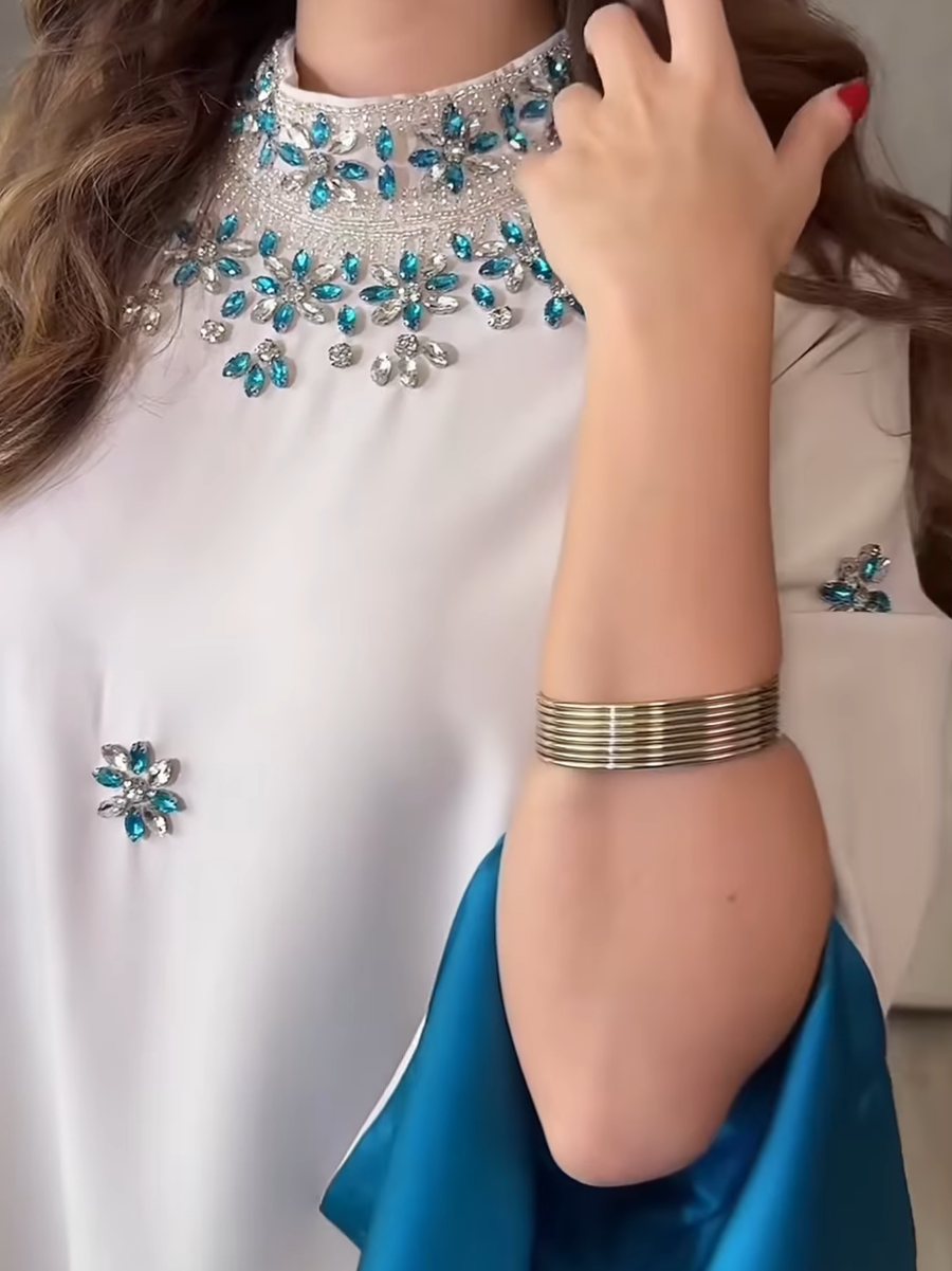 Luxurious evening dress with turquoise crystal embroidery
