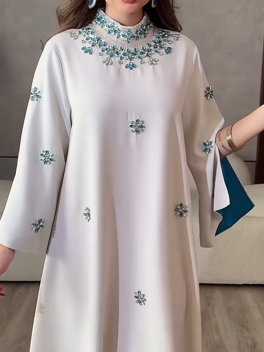 Luxurious evening dress with turquoise crystal embroidery