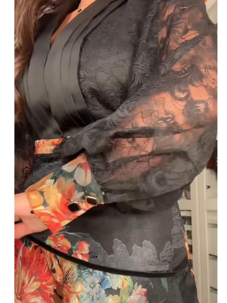 Black printed dress with lace sleeves and a V-neck