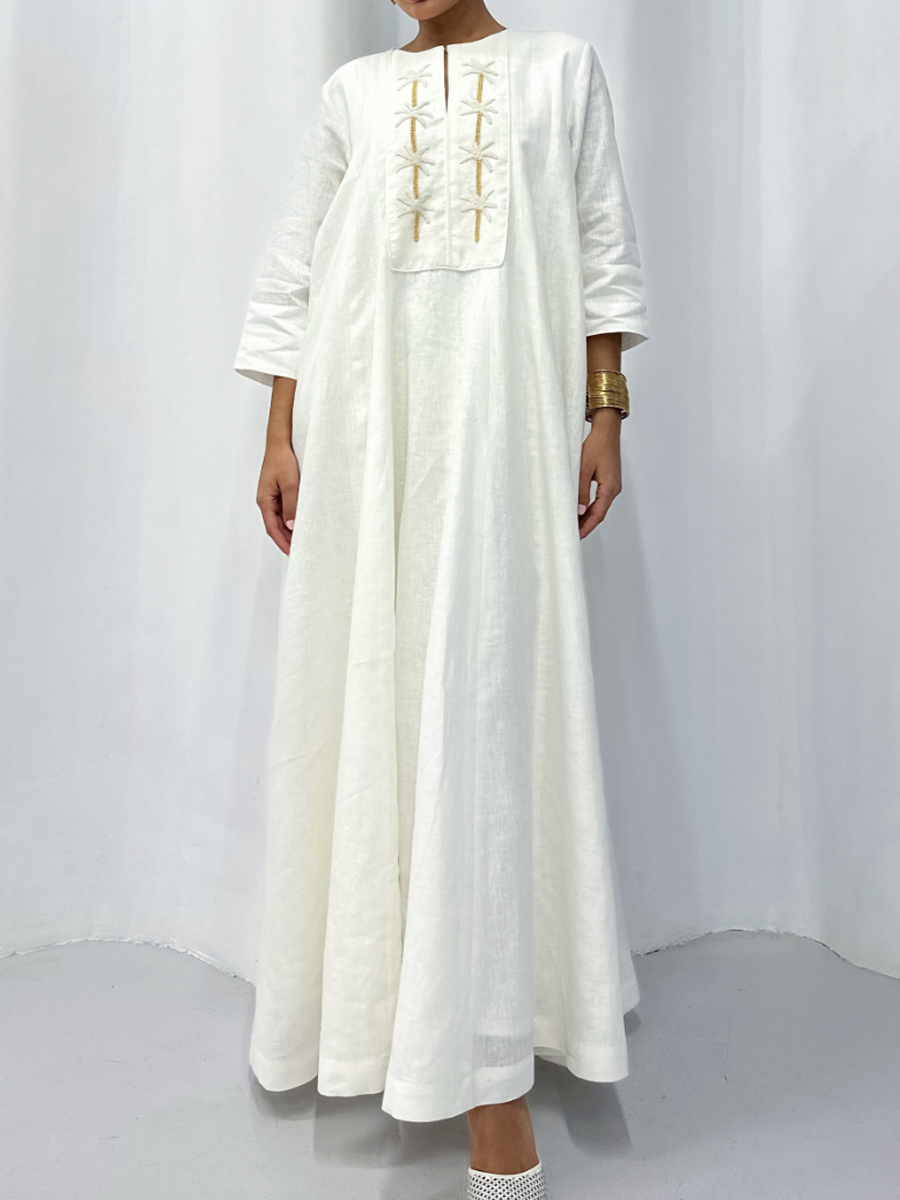 Elegant white linen embroidered dress