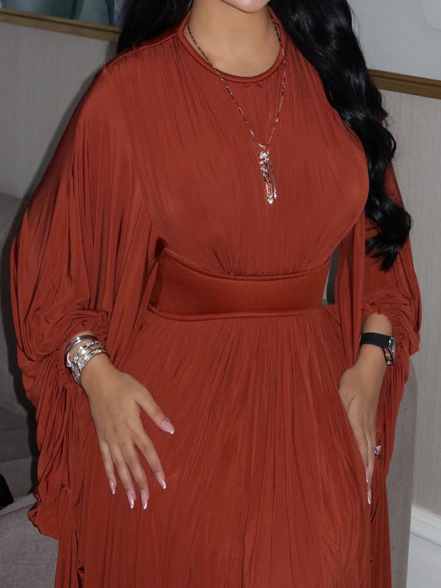 Orange dress with a round neck and pleats