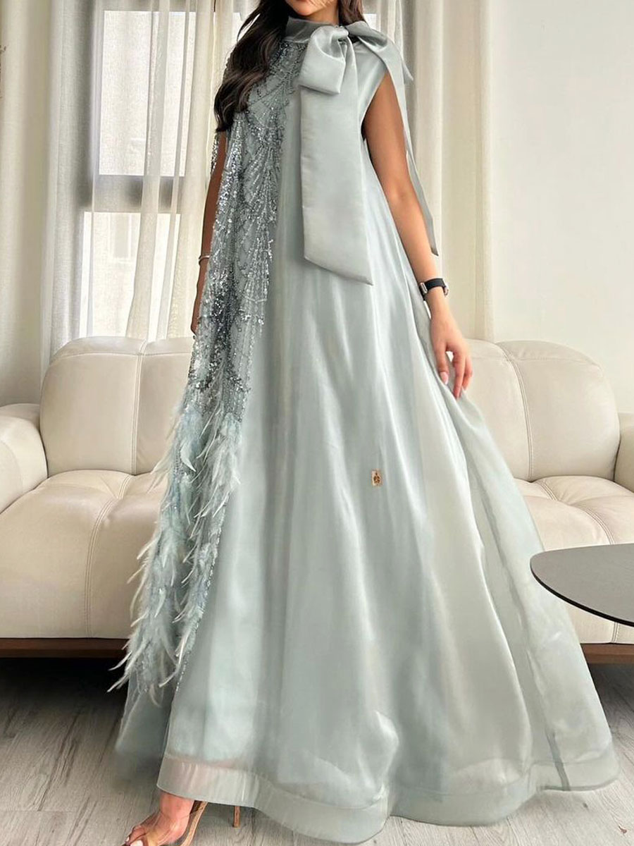 Light blue dress decorated with butterfly feathers and sequins (promotional price)