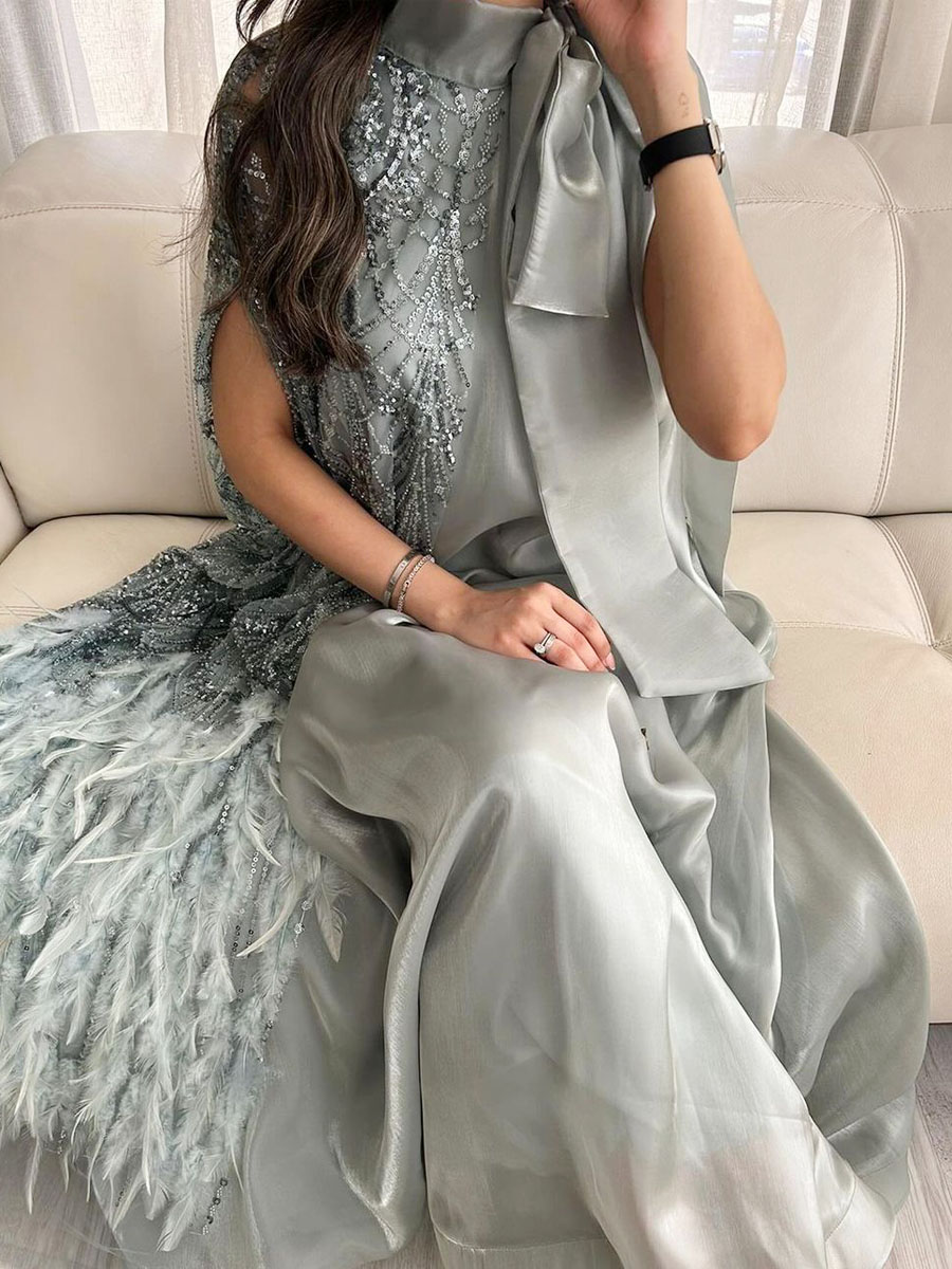 Light blue dress decorated with butterfly feathers and sequins (promotional price)