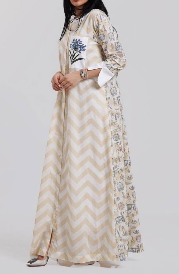 Elegant long dress with a chevron design and floral embroidery