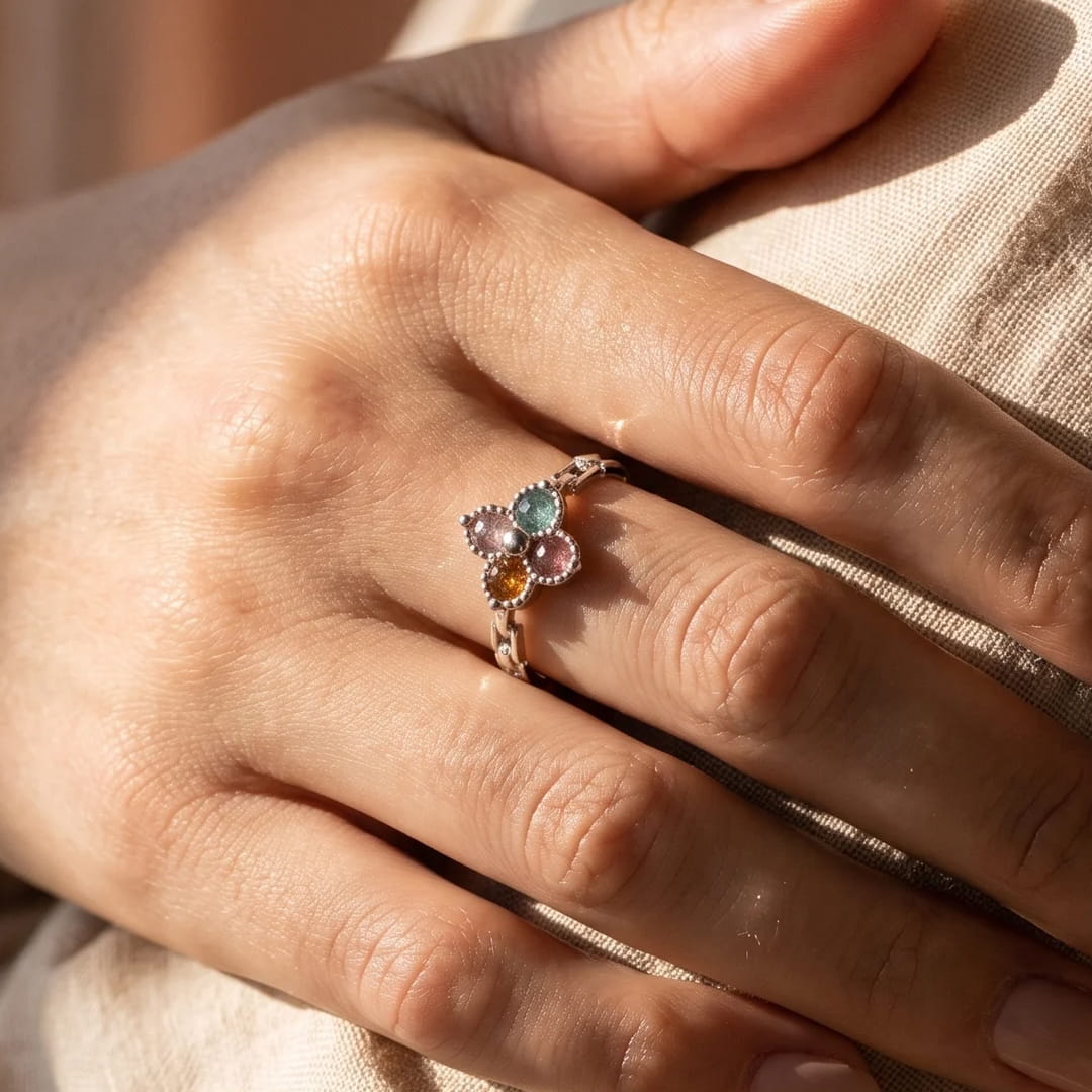 Close-up of the multicolor tourmaline stones on the clover ring