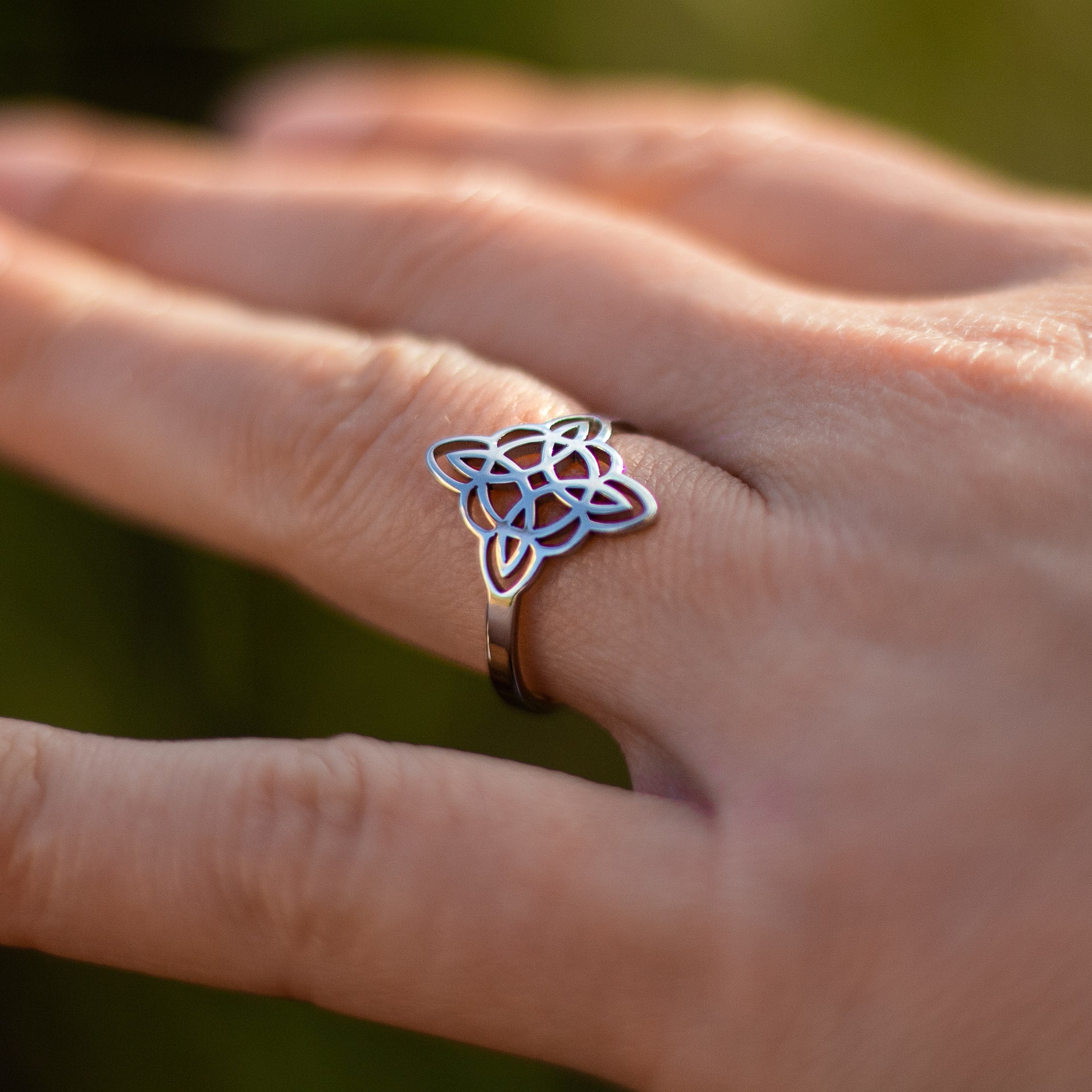 Model wearing the adjustable Witch's Knot ring - KARMAKIND