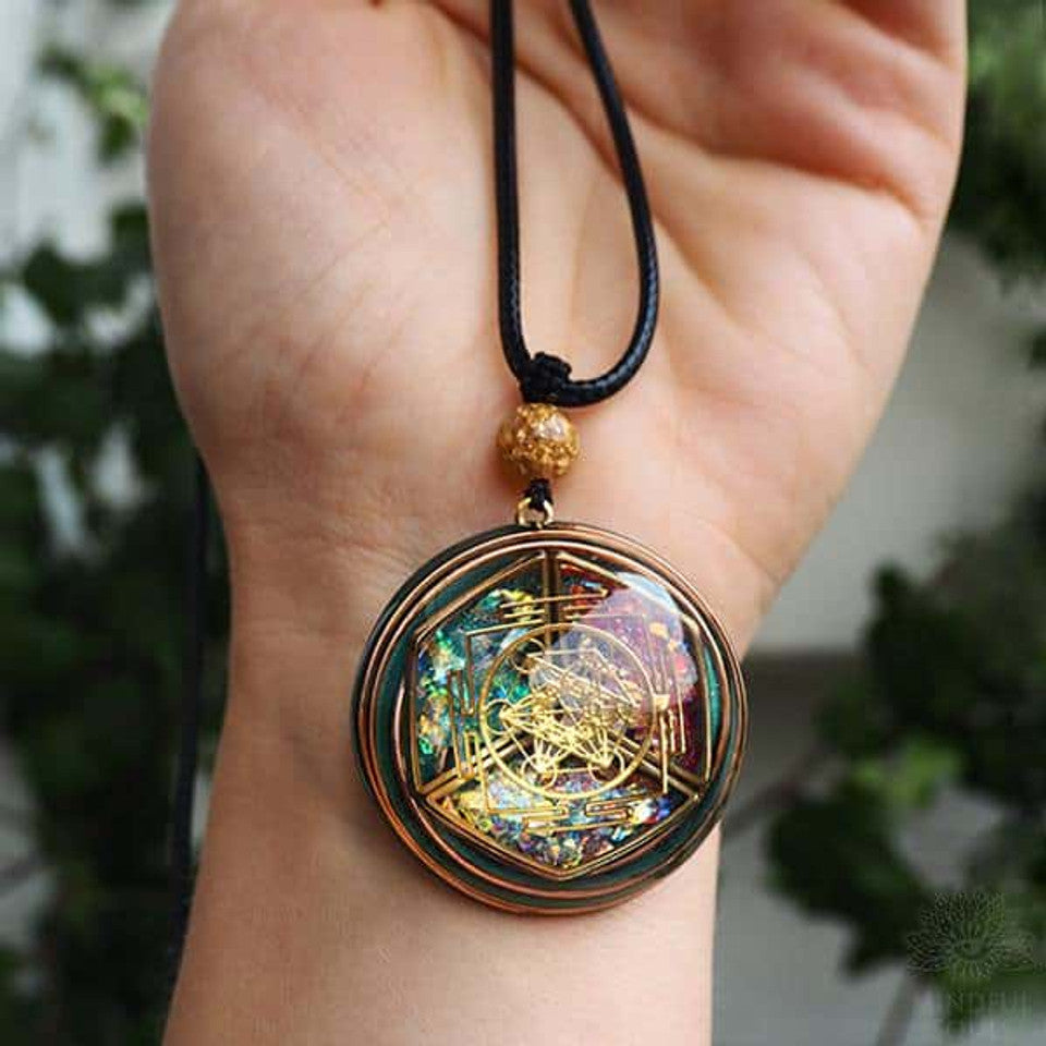 Orgonite pendant detail showing the 7 stones