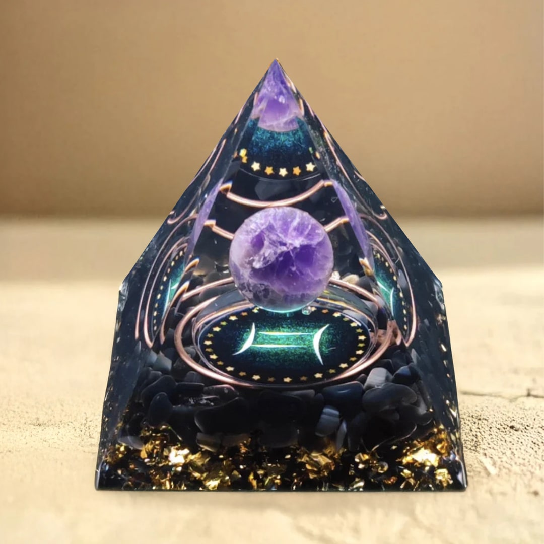 Close-up of the astrological sign symbol on the Orgonite pyramid - KARMAKIND