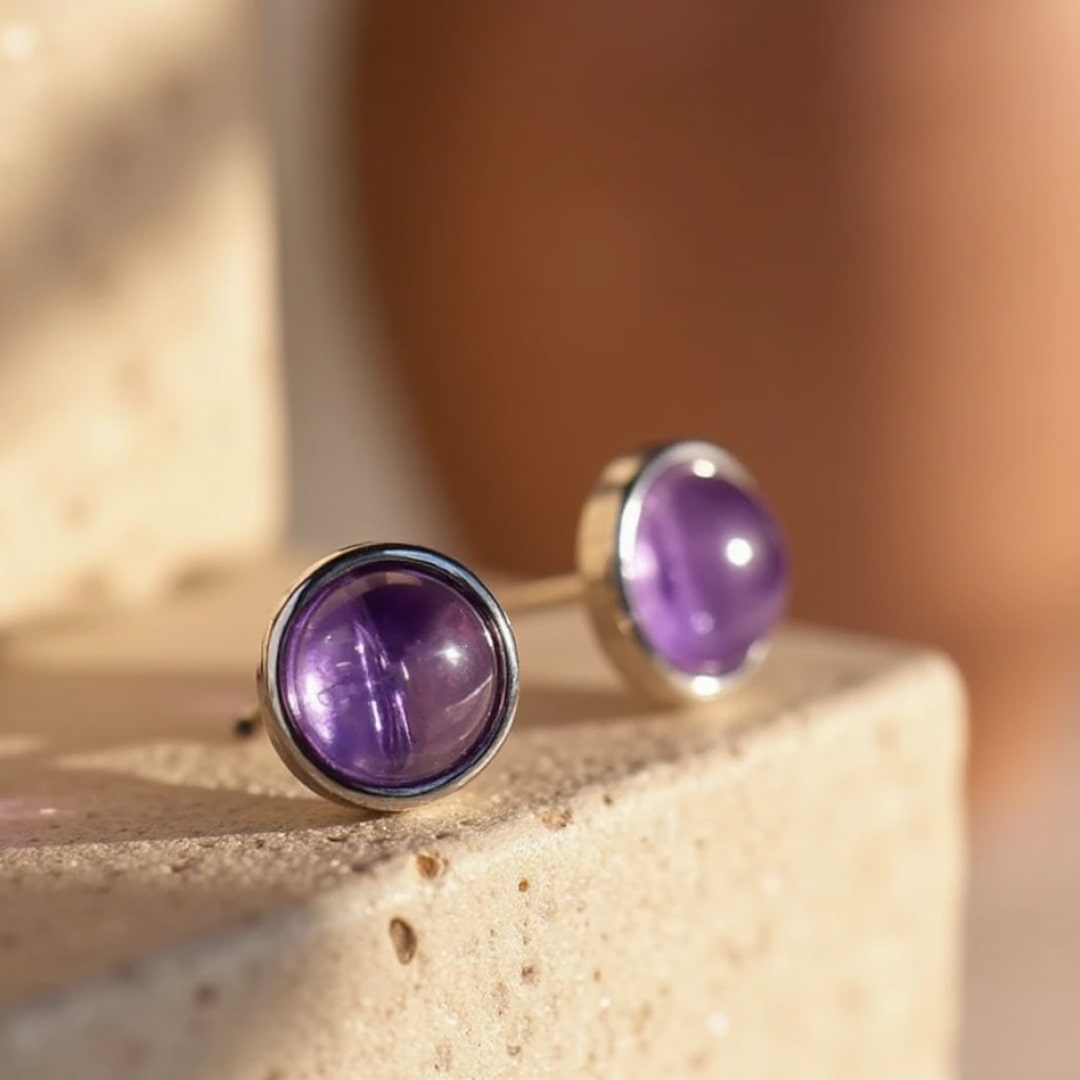 Set of amethyst and silver stud earrings