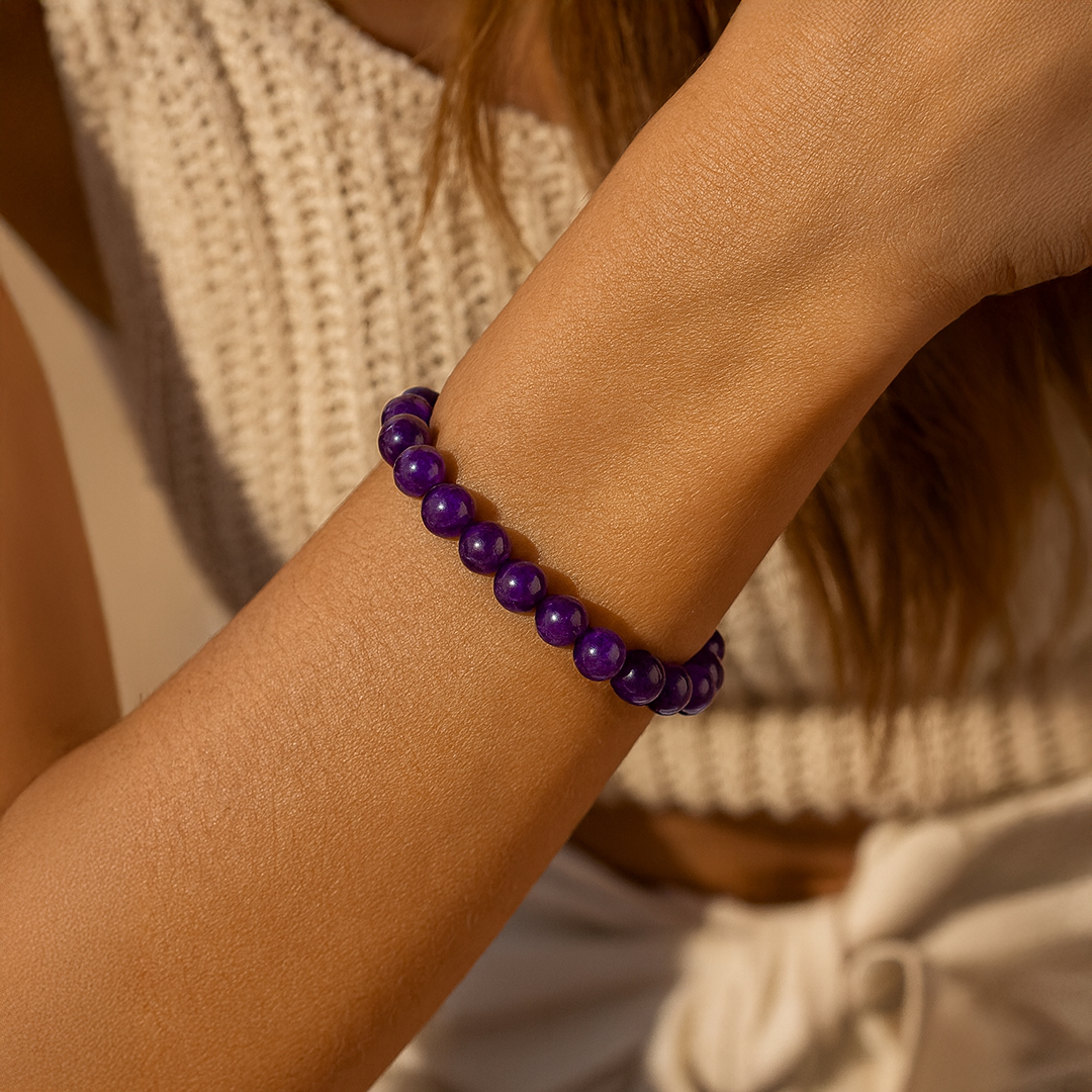 Close-up of the luminous Amethyst beads on the bracelet