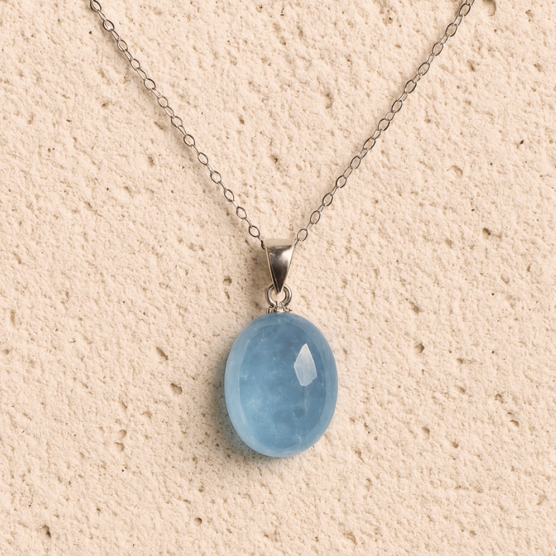 The soft blue light of the Aquamarine pendant