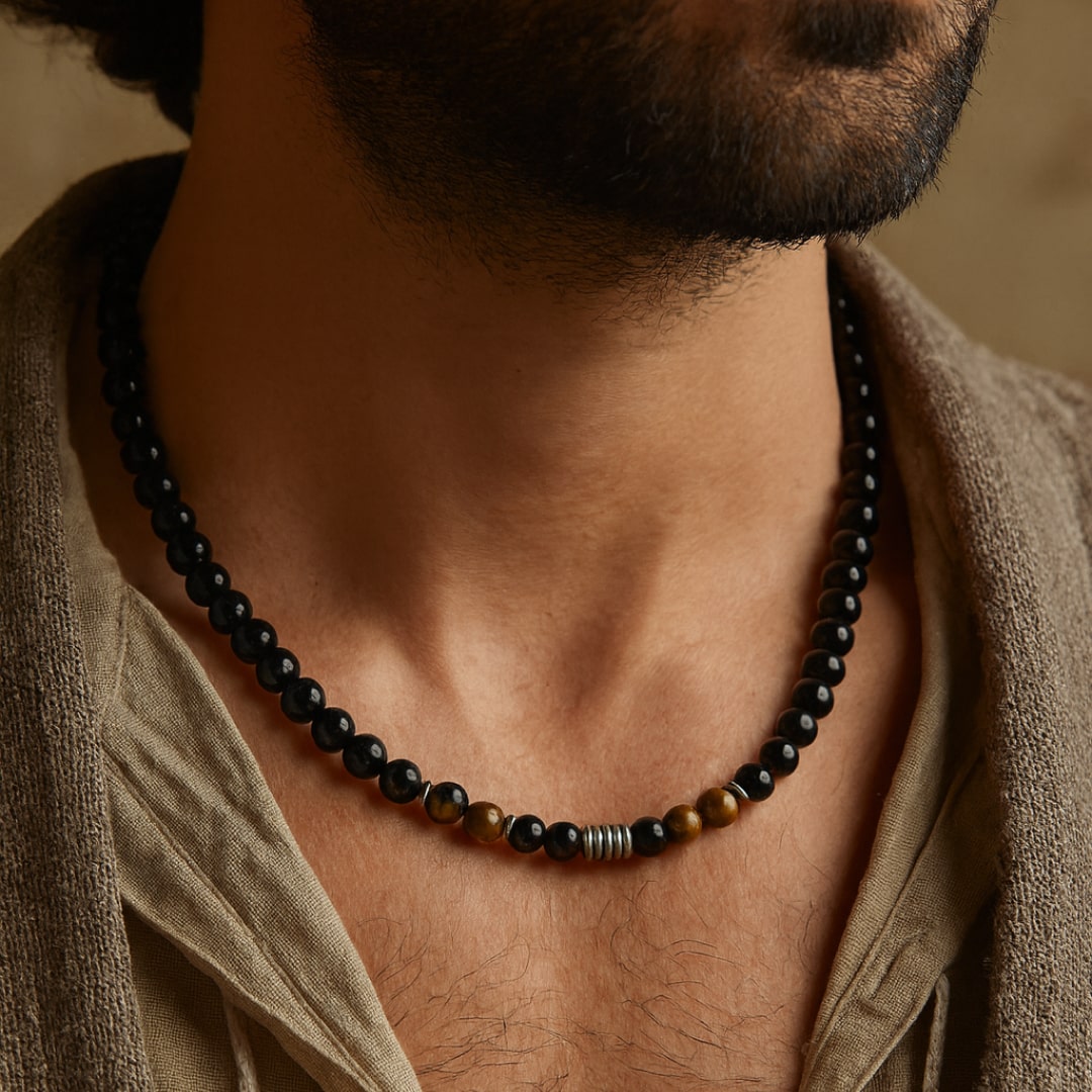 Close-up of Black Obsidian stone on necklace - KARMAKIND