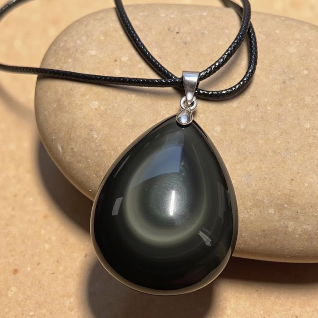 Celestial Eye Obsidian Drop Pendant by KARMAKIND, showing the eye detail