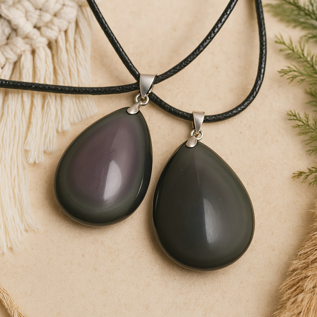 The Celestial Eye Obsidian pendant worn on a chain