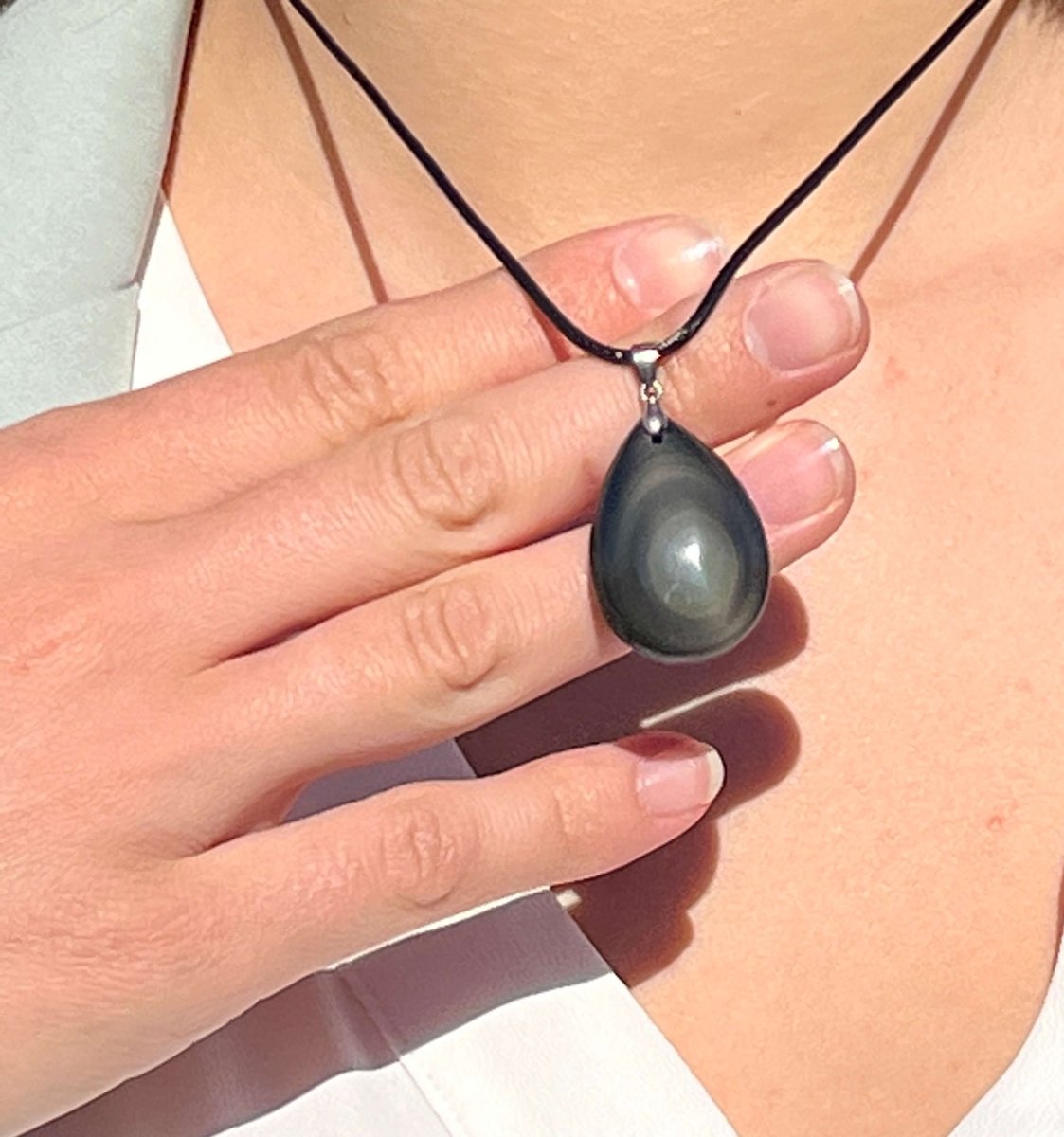 Pendant showing the reflective quality of the obsidian