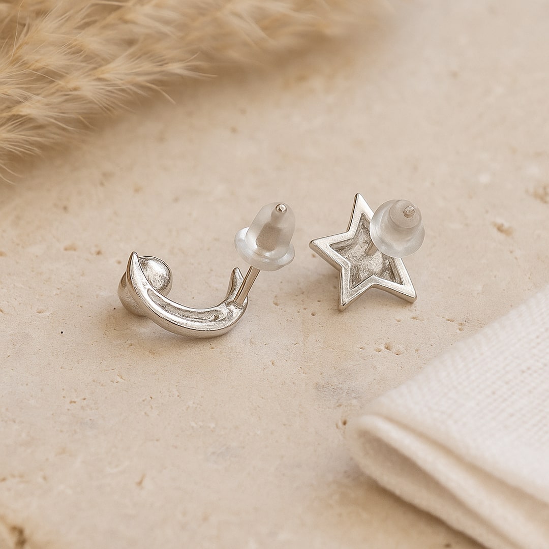 Detail of the star charm on the "Moon Star" earring - KARMAKIND