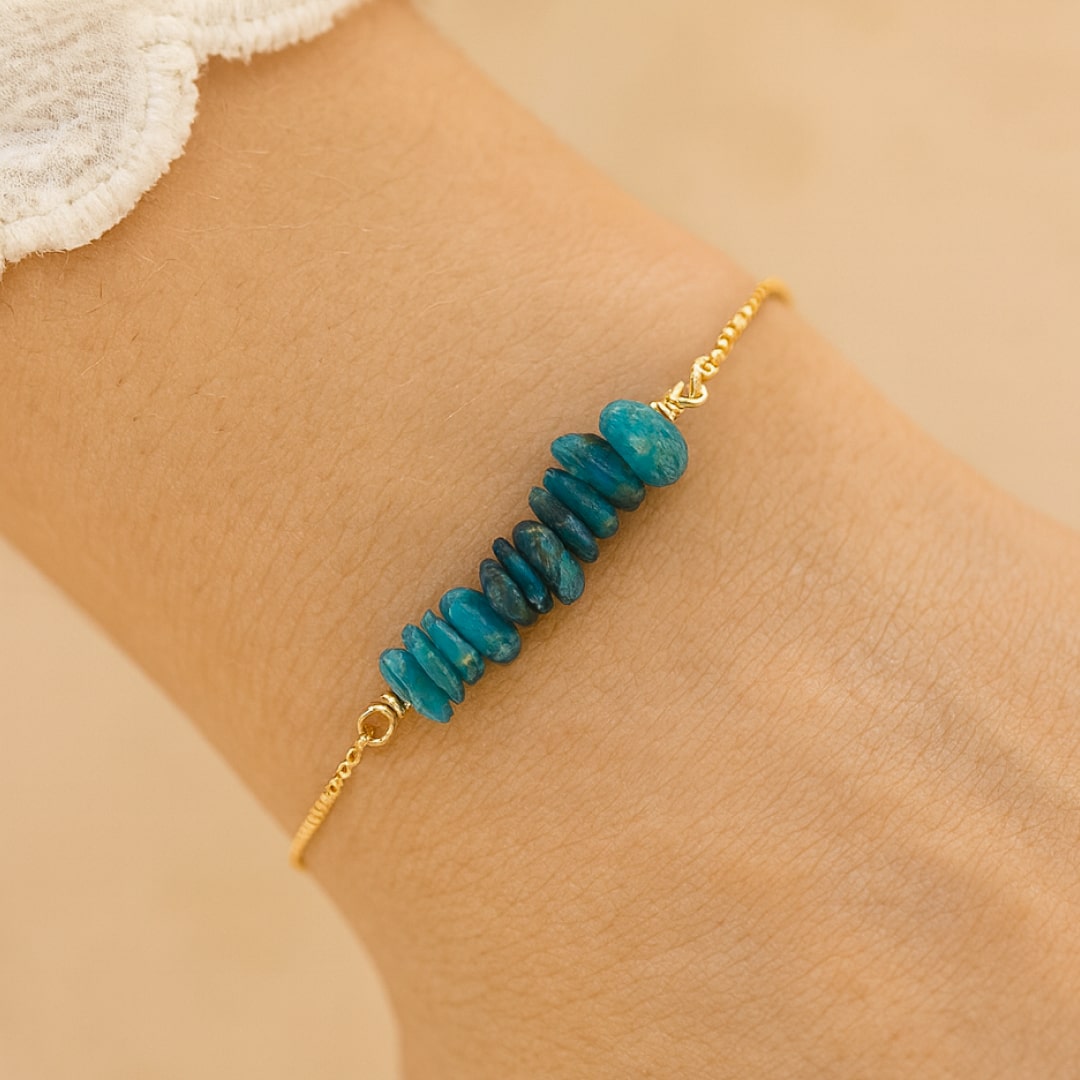 A person selecting a stone for their bracelet - KARMAKIND